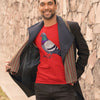 Man wearing a red pigeon t-shirt with a geometric design from Infinitees
